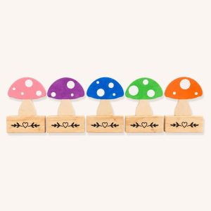 Five colourful wooden mushroom show jump fillers with individual custom pine bases on a plain background