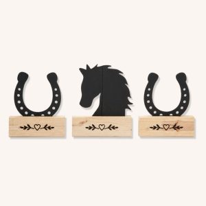 Black wooden horse head and two horseshoe show jump fillers with individual custom pine bases