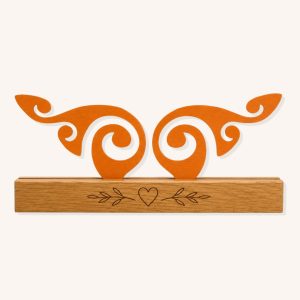 Orange scroll design wooden show jump filler with open curved detail and custom pine base on a plain background